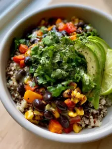 Close-up of Black Bean and Corn Quinoa Salad showing tri-color grains and fire-roasted corn kernels.